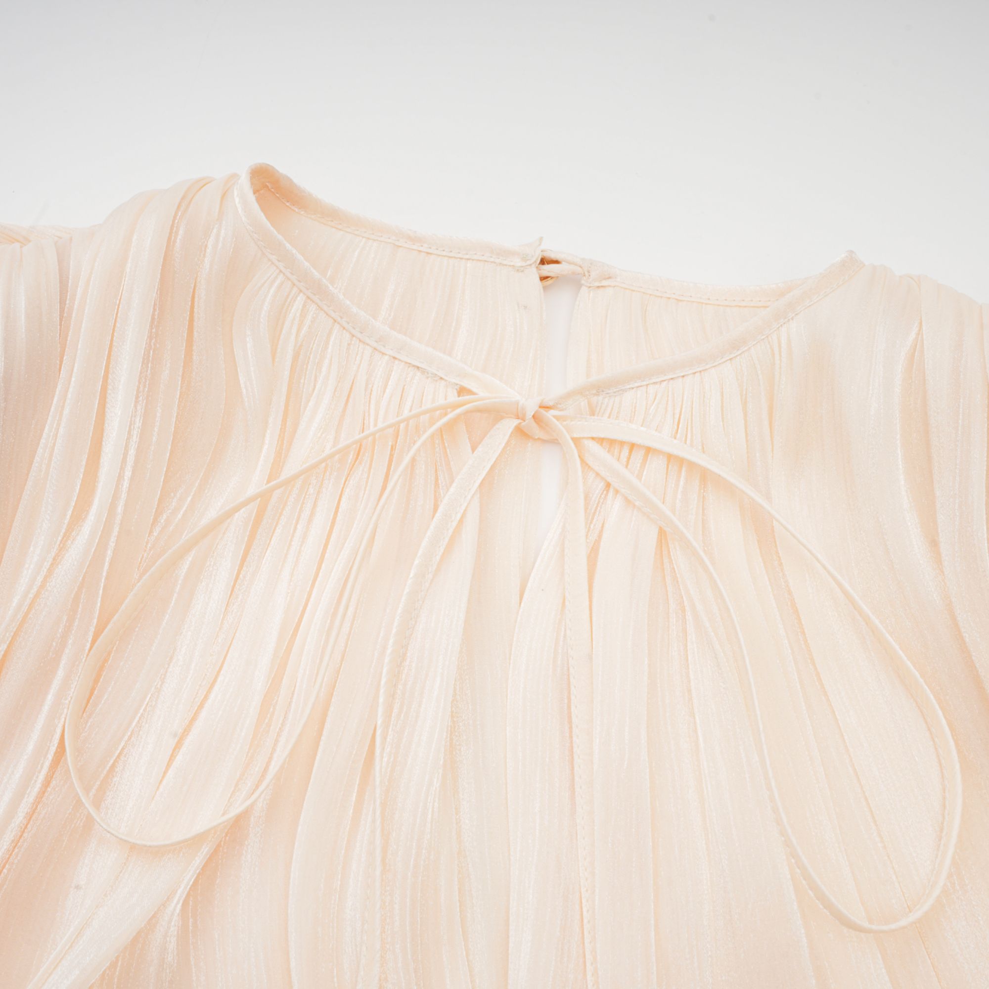 Céleste Ivory Pleated Mini Dress
