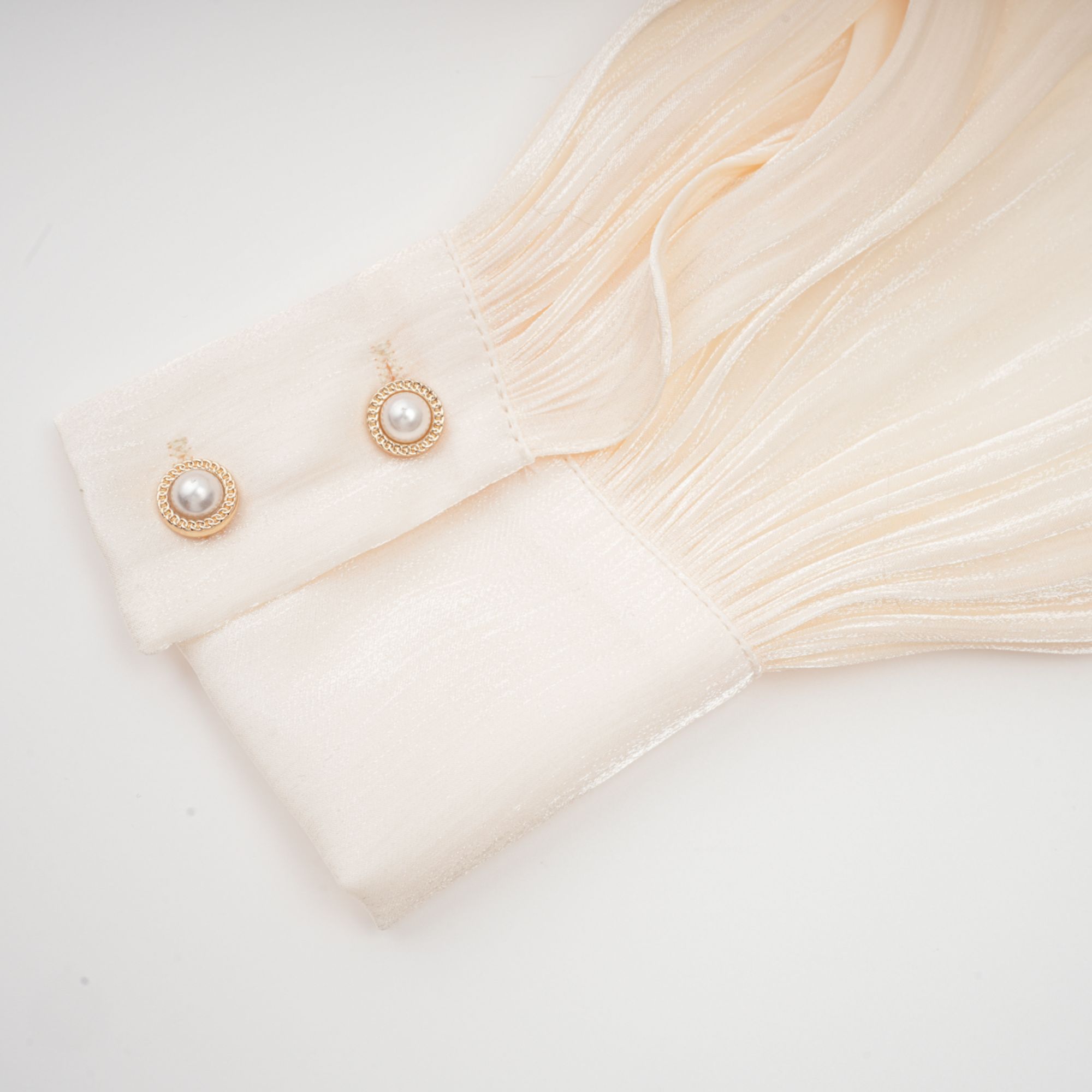 Céleste Ivory Pleated Mini Dress