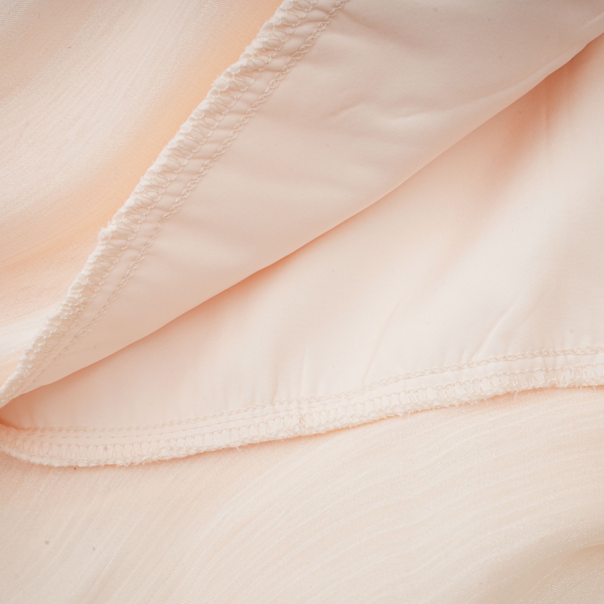 Céleste Ivory Pleated Mini Dress